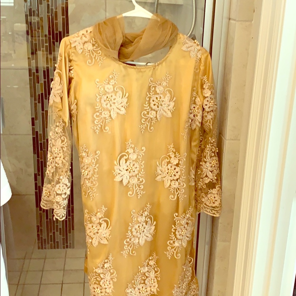 Beautiful golden smock with pants and wrap